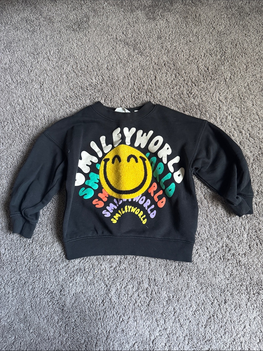 H&M Black Sweatshirt with Yellow Smiley and Multicolor Text